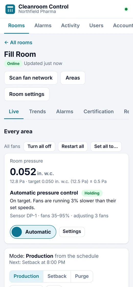 The Cleanroom Control app on a phone: a room's Live tab with automatic pressure control holding its target.
